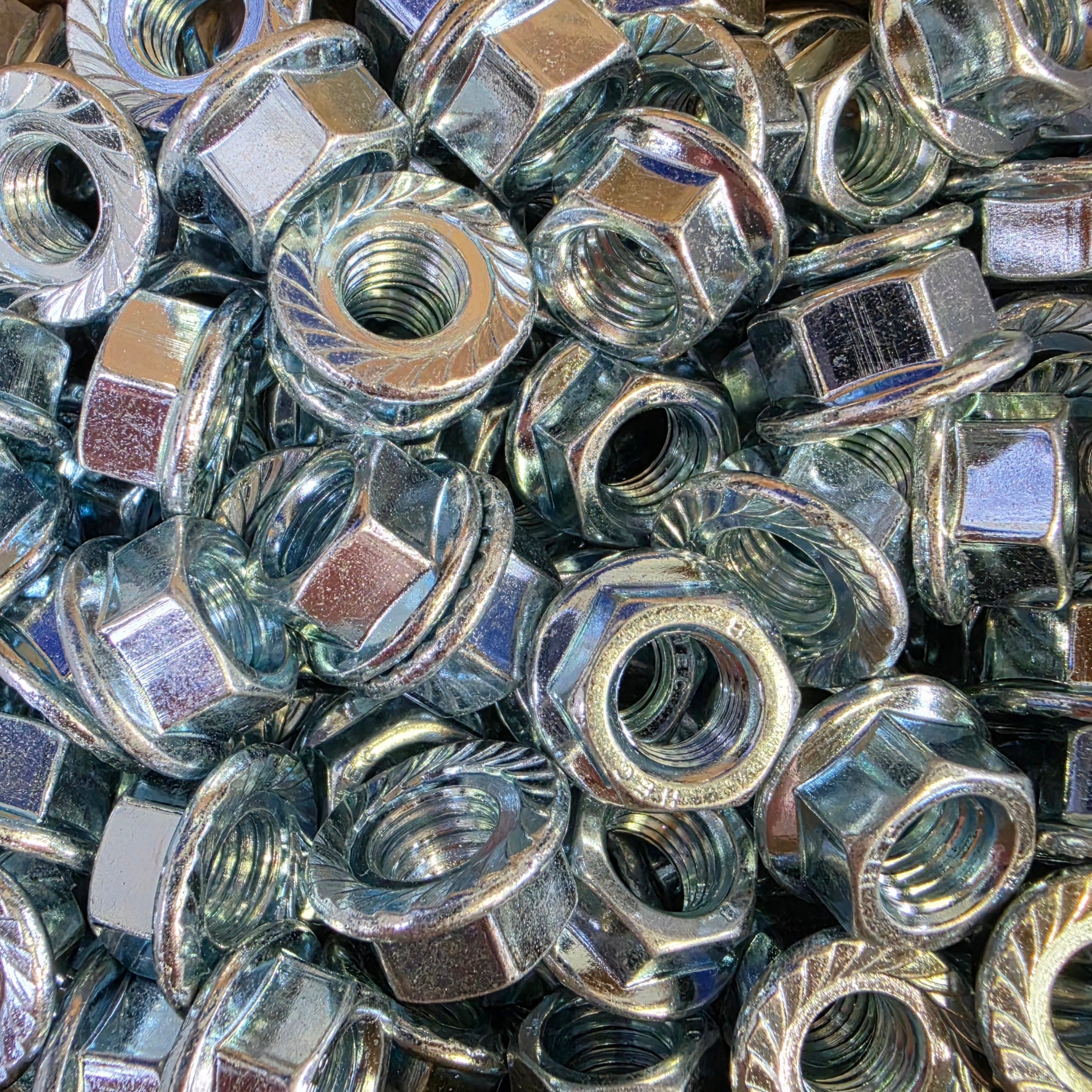 Zinc flange nuts from Bolt Direct, showing close-up of threaded metal nuts with flanged base for secure fastening.