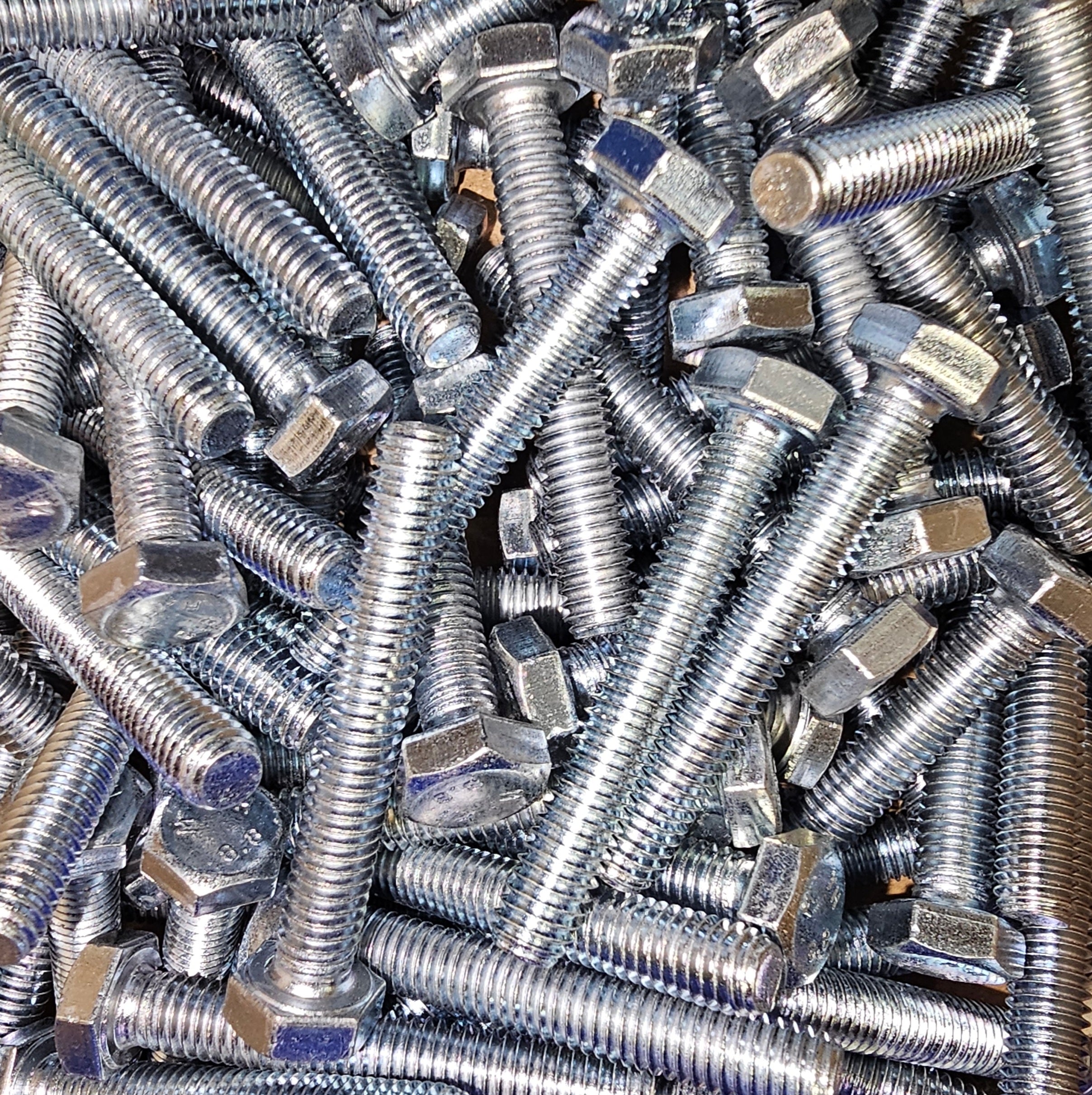 G8.8 zinc set screws by Bolt Direct, showing a close-up of shiny zinc-coated threaded fasteners for industrial fastening.