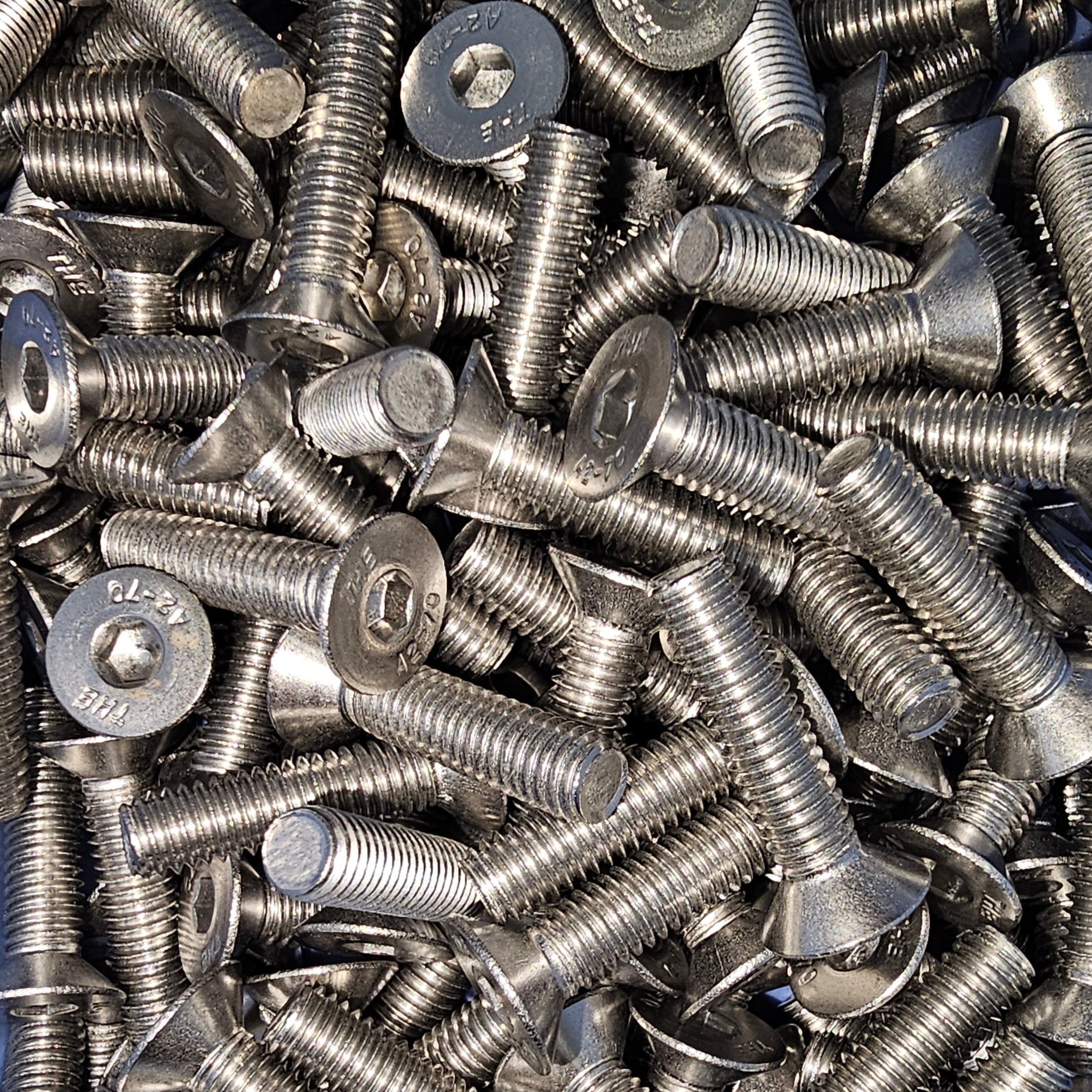 Stainless steel A2-70 countersunk socket screw from Bolt Direct, showing the screw's head and threaded body on a white background.