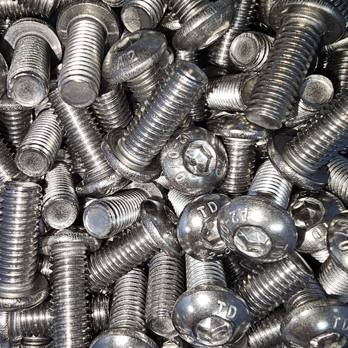 Stainless steel A2-70 button socket screws with hex drive, shown in a close-up image, designed for durable fastening applications.